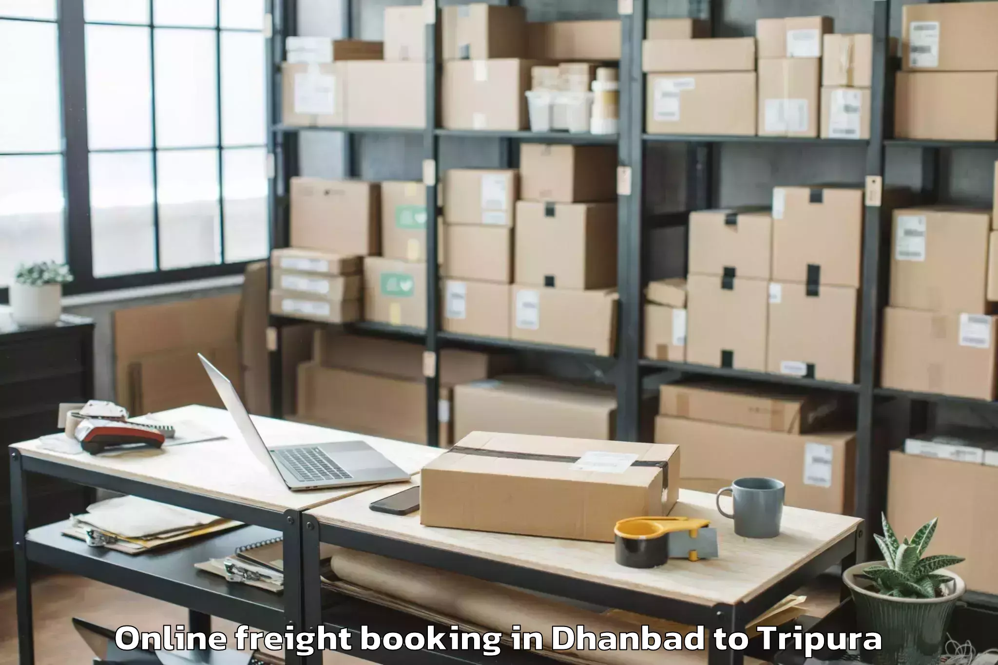 Book Dhanbad to Melaghar Online Freight Booking Online